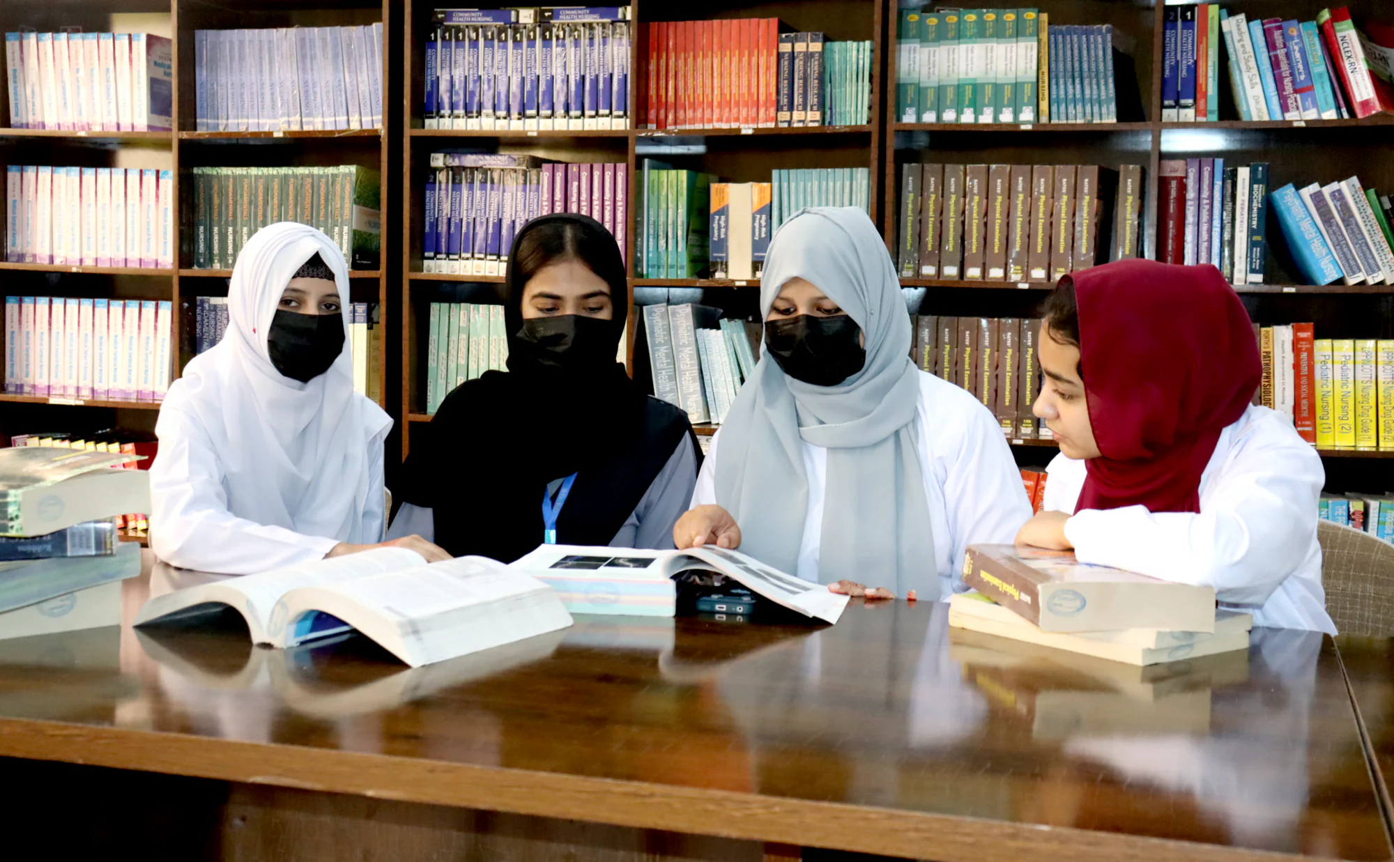 Students studying together in the ONIMS library